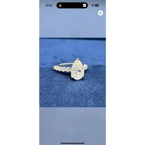 5CTW Pear cut moissanite ring with side stones